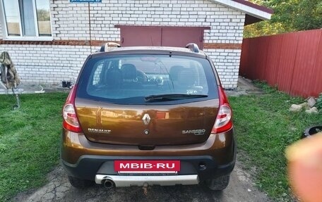 Renault Sandero II рестайлинг, 2013 год, 700 000 рублей, 2 фотография