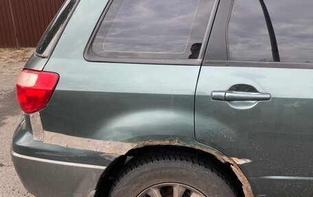 Mitsubishi Outlander III рестайлинг 3, 2006 год, 400 000 рублей, 7 фотография