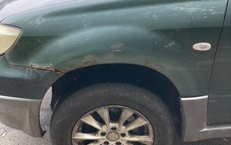 Mitsubishi Outlander III рестайлинг 3, 2006 год, 400 000 рублей, 16 фотография