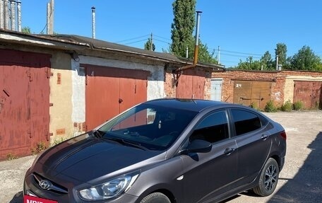 Hyundai Solaris II рестайлинг, 2011 год, 750 000 рублей, 4 фотография
