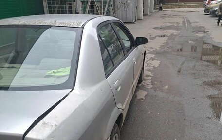 Mazda Familia, 2001 год, 150 000 рублей, 3 фотография