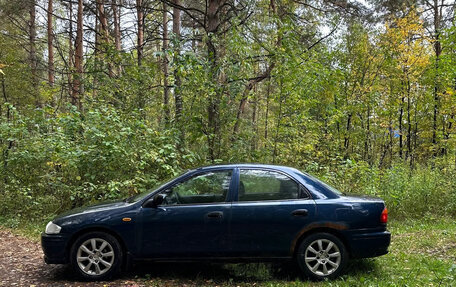 Mazda 323, 1998 год, 87 000 рублей, 5 фотография