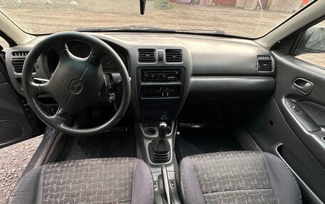 Mazda 323, 1998 год, 87 000 рублей, 7 фотография