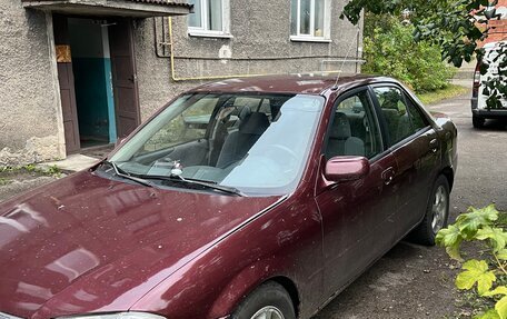 Mazda Protege, 1999 год, 245 000 рублей, 2 фотография