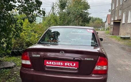 Mazda Protege, 1999 год, 245 000 рублей, 4 фотография