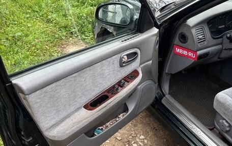KIA Magentis I, 2004 год, 130 000 рублей, 9 фотография