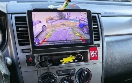 Nissan Tiida, 2011 год, 870 000 рублей, 7 фотография