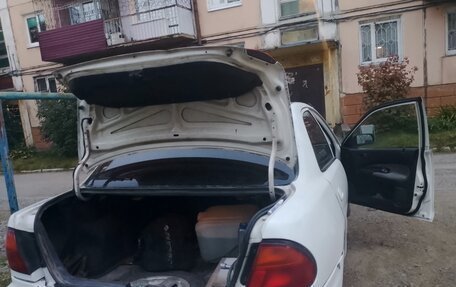 Mazda Familia, 1996 год, 260 000 рублей, 14 фотография