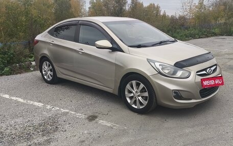 Hyundai Solaris II рестайлинг, 2011 год, 590 000 рублей, 3 фотография