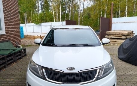KIA Rio III рестайлинг, 2012 год, 750 000 рублей, 2 фотография