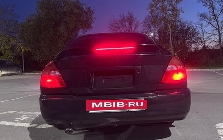 Mitsubishi Mirage VI рестайлинг, 2000 год, 300 000 рублей, 2 фотография