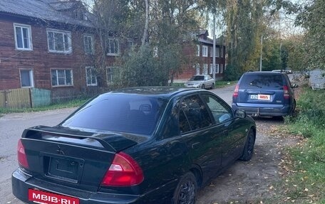 Mitsubishi Mirage VI рестайлинг, 2000 год, 300 000 рублей, 6 фотография