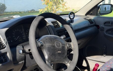 Mazda 323, 1998 год, 150 000 рублей, 8 фотография