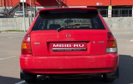 Mazda 323, 1998 год, 150 000 рублей, 5 фотография