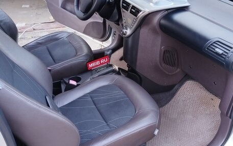 Toyota iQ, 2009 год, 1 095 000 рублей, 26 фотография