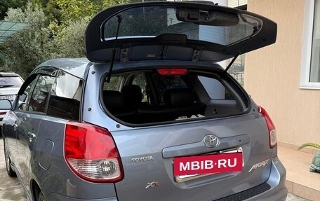 Toyota Matrix, 2004 год, 670 000 рублей, 9 фотография