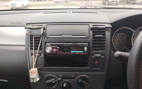Nissan Tiida, 2010 год, 650 000 рублей, 4 фотография