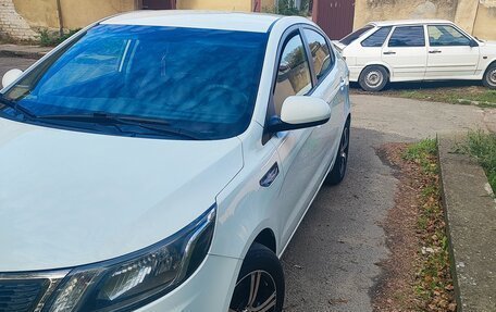 KIA Rio III рестайлинг, 2012 год, 880 000 рублей, 9 фотография