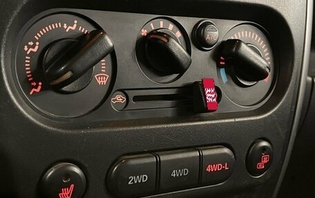Suzuki Jimny, 2012 год, 890 000 рублей, 23 фотография