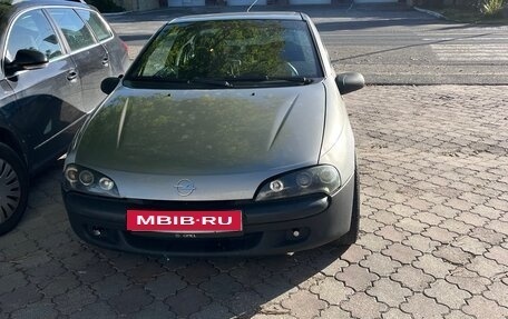 Opel Tigra, 1995 год, 260 000 рублей, 1 фотография