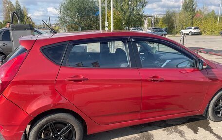Hyundai Solaris II рестайлинг, 2011 год, 670 000 рублей, 2 фотография