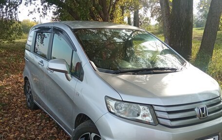 Honda Freed I, 2011 год, 1 120 000 рублей, 16 фотография