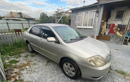 Toyota Corolla, 2004 год, 650 000 рублей, 3 фотография
