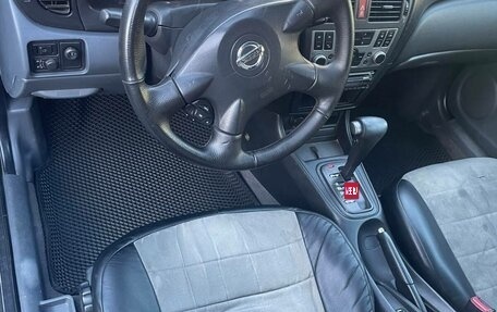 Nissan Almera, 2004 год, 365 000 рублей, 14 фотография