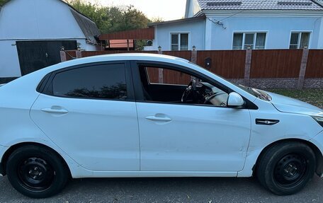KIA Rio III рестайлинг, 2014 год, 550 000 рублей, 9 фотография