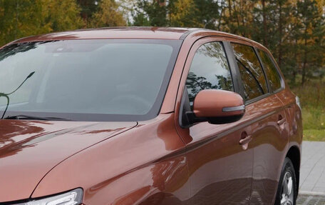 Mitsubishi Outlander III рестайлинг 3, 2013 год, 1 200 000 рублей, 17 фотография