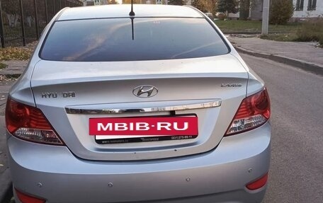 Hyundai Solaris II рестайлинг, 2011 год, 650 000 рублей, 5 фотография