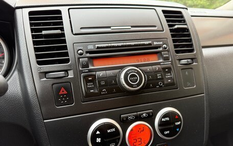 Nissan Tiida, 2011 год, 890 000 рублей, 27 фотография