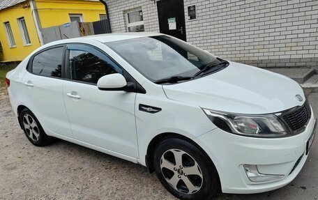 KIA Rio III рестайлинг, 2012 год, 750 000 рублей, 3 фотография