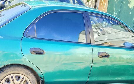 Mazda 323, 1998 год, 135 000 рублей, 4 фотография