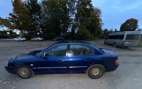 KIA Magentis I, 2003 год, 230 000 рублей, 3 фотография