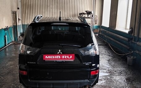 Mitsubishi Outlander III рестайлинг 3, 2010 год, 1 300 000 рублей, 11 фотография
