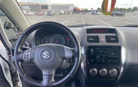 Suzuki SX4 II рестайлинг, 2009 год, 690 000 рублей, 21 фотография