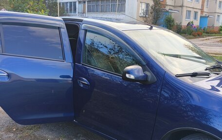 Renault Logan I, 2014 год, 750 000 рублей, 3 фотография