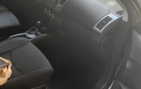 Mitsubishi Outlander III рестайлинг 3, 2012 год, 1 130 000 рублей, 23 фотография