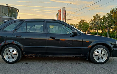Mazda 323, 1999 год, 150 000 рублей, 3 фотография