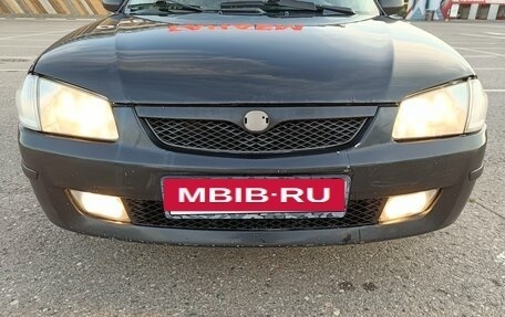 Mazda 323, 1999 год, 150 000 рублей, 8 фотография