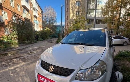 Suzuki SX4 II рестайлинг, 2010 год, 600 000 рублей, 1 фотография