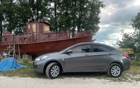 Hyundai Solaris II рестайлинг, 2011 год, 600 000 рублей, 8 фотография