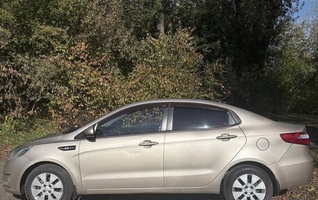 KIA Rio III рестайлинг, 2012 год, 730 000 рублей, 2 фотография