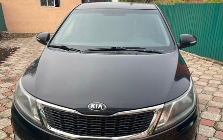 KIA Rio III рестайлинг, 2013 год, 750 000 рублей, 4 фотография