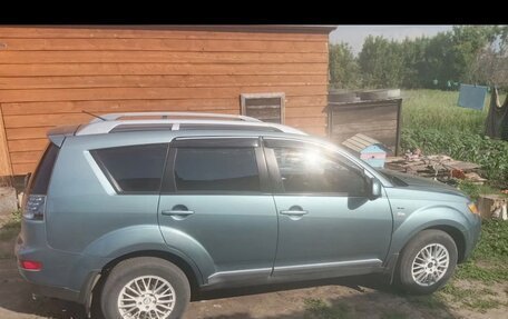 Mitsubishi Outlander III рестайлинг 3, 2006 год, 1 000 000 рублей, 2 фотография