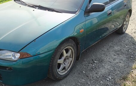 Mazda 323, 1997 год, 115 000 рублей, 9 фотография