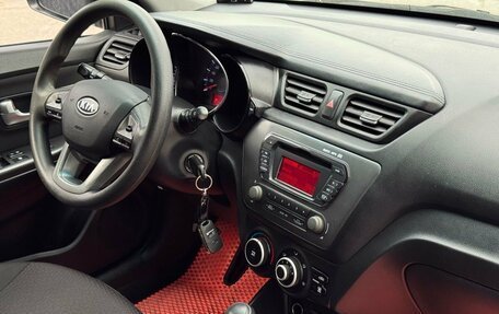 KIA Rio III рестайлинг, 2012 год, 810 000 рублей, 24 фотография