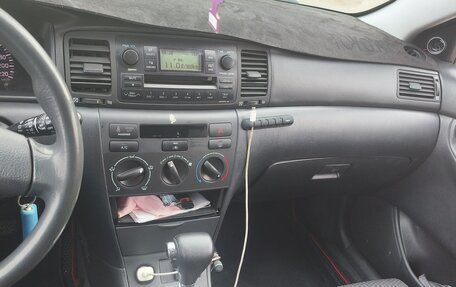 Toyota Corolla, 2005 год, 600 000 рублей, 11 фотография