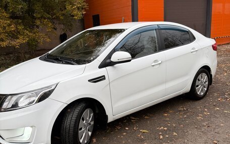 KIA Rio III рестайлинг, 2013 год, 650 000 рублей, 3 фотография